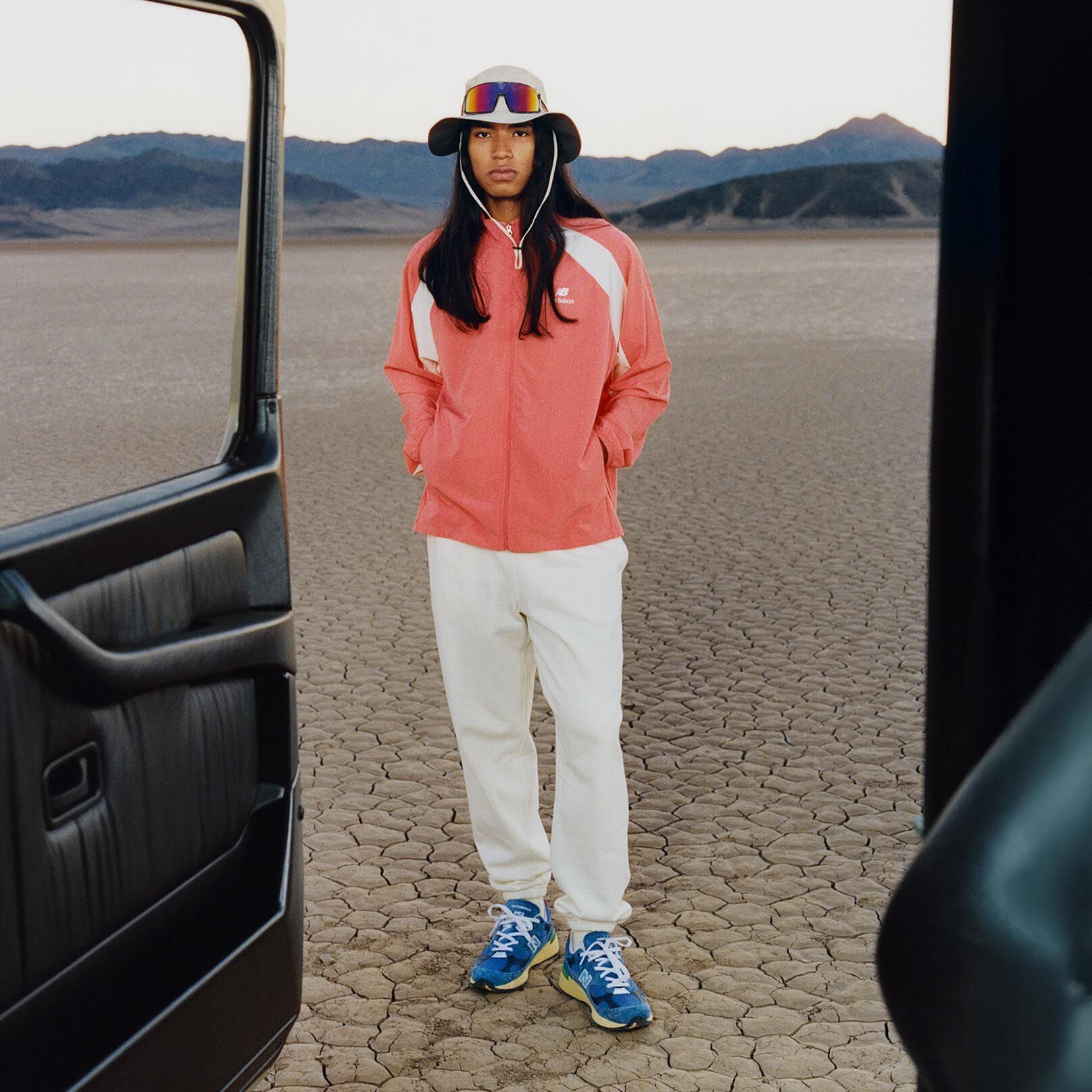 Man wearing a New Balance jacket in the desert